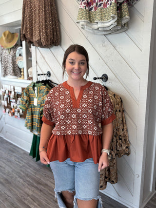 Rust Bloom Contrast Peplum Top