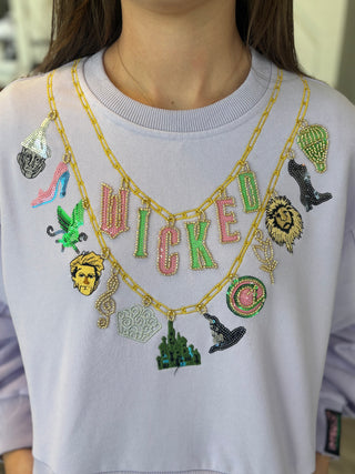 Queen of Sparkles Licensed Lavender Wicked Charm Necklace Sweatshirt